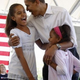 Barack Obama with Malia and Sasha Obama (Uptown magazine)